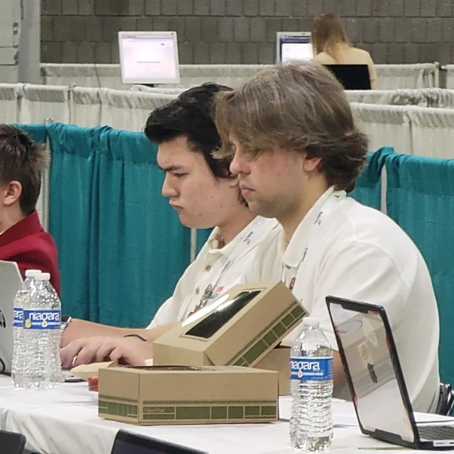 From Atlanta today!

Not all competitions are where we can get photos, but we snagged a couple of snapshots from NLSC! 

Competition is in full swing today and tomorrow. We caught Kian and Daniel, our Web Design team, looking very focused, and Mar, who found her T-shirt design on display.

So exciting!!! Good luck, Dragons! 🔥🐉

#MTCHSIdaho #SkillsUSA #NLSC #SkillsUSANationals #TeamIdaho #idahoskillsusa #skillsusaidaho #studentsuccess
